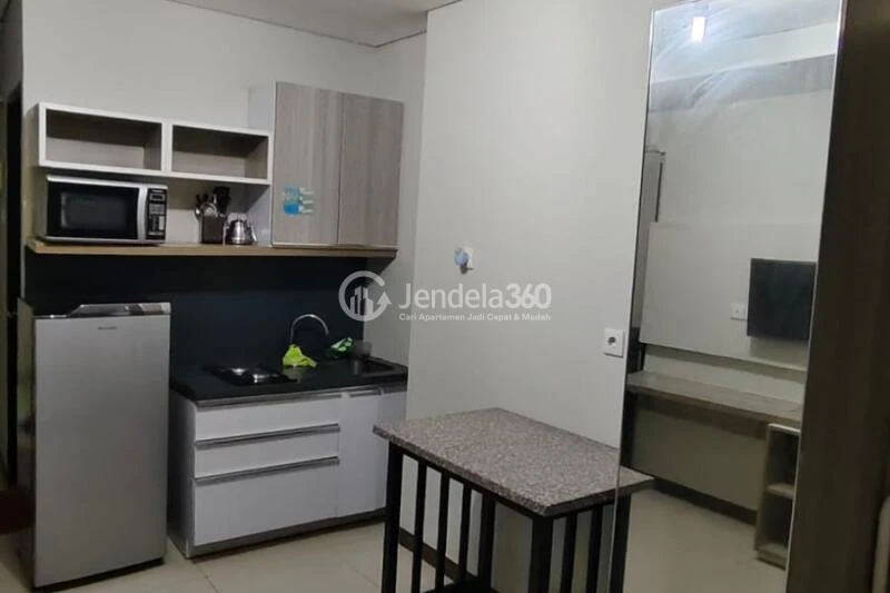Dining Room Studio Apartment with City View at Nifarro Park Apartment