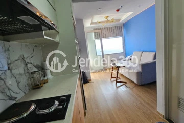 Kitchen 2BR Apartment with City View at Grand Asia Afrika Residence