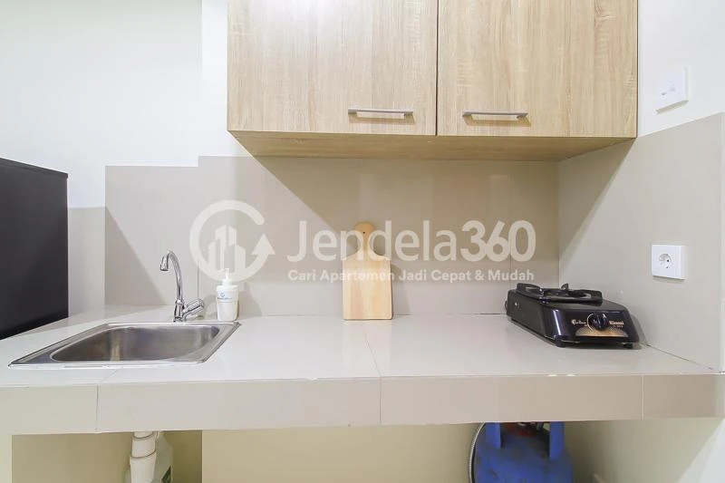Kitchen Modest 1BR Apartment with Spa & Fitness Center at Puri Orchard Apartment