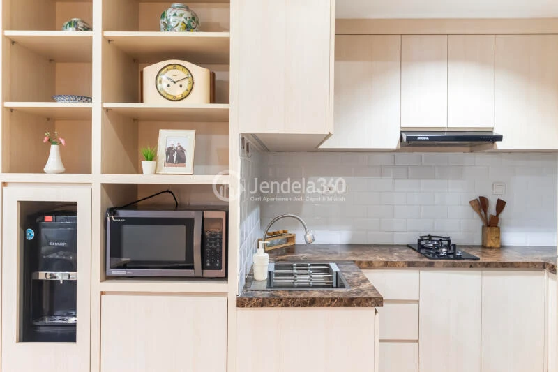 Kitchen 1BR Apartment with City View at Vasanta Innopark Apartment