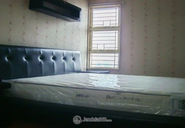Bedroom Comfortable 2BR Apartment at Grand Tropic Suites Apartment Low Floor