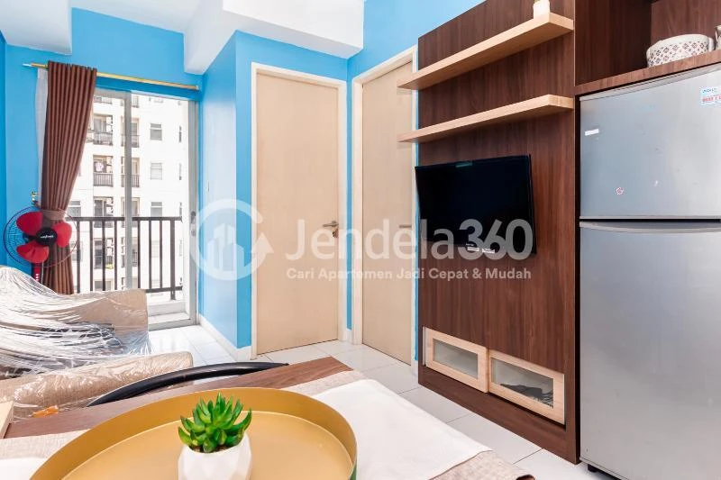 Living Room Cozy 2BR Apartment Middle Floor with City View at Kota Ayodhya Apartment