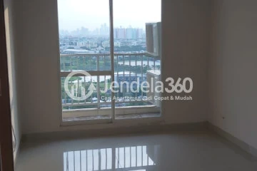 Living Room Middle Floor 1BR Apartment with Pool View at Callia Apartment