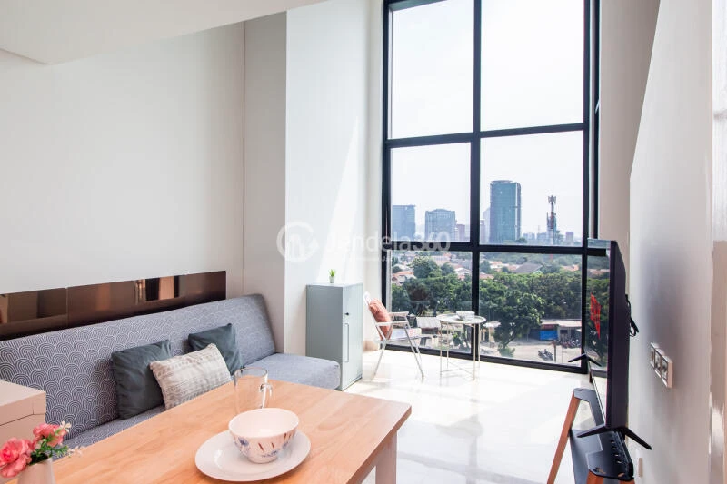 Living Room Studio Apartment with City View at Southgate Residence