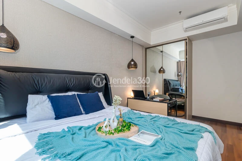 Bedroom 1 2BR Casa Grande Apartment at Low Floor Swimming Pool View
