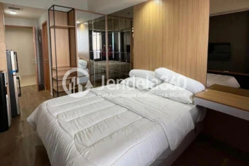 Bedroom High Floor Studio Apartment with City View at Evenciio Apartment