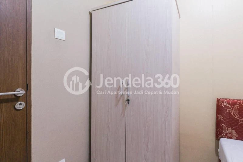 Bedroom 2 Cozy 2BR Apartment at Tifolia Apartment