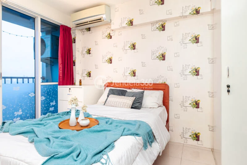 Bedroom Peaceful Studio Apartment High Floor with City View at Tifolia Apartment