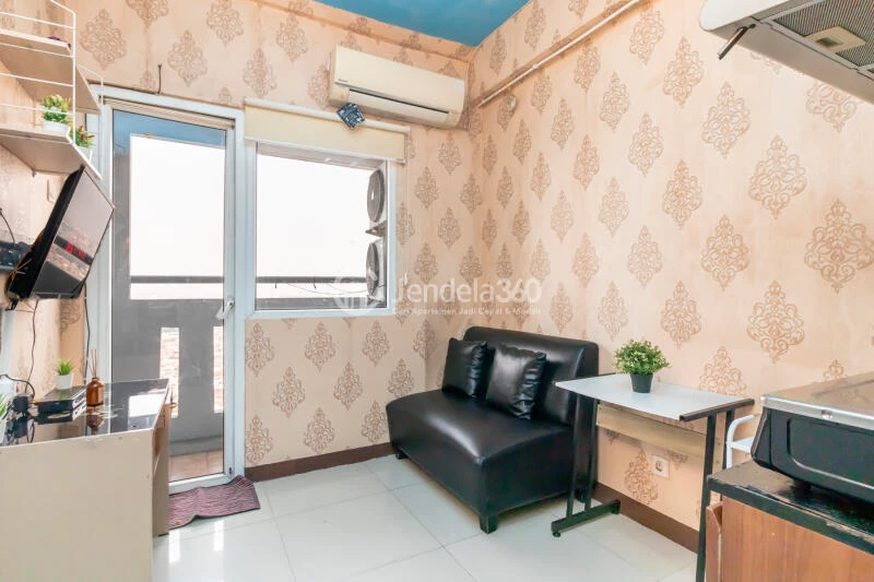 Living Room High Floor 2BR Apartment with City View at Green Pramuka City Apartment