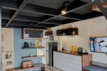 Living Room Strategic Location 1BR Apartment Middle Floor with City View at Bintaro Icon Apartment