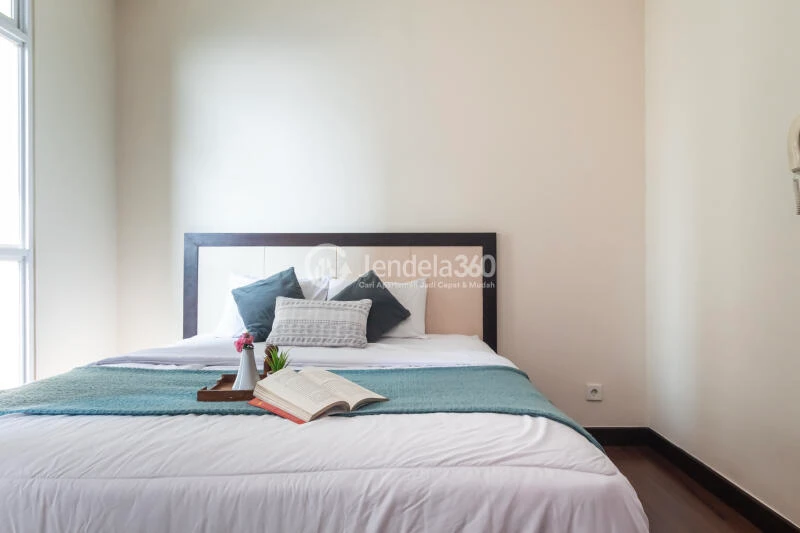 Bedroom High Floor Studio Apartment with City View at Puri Orchard Apartment
