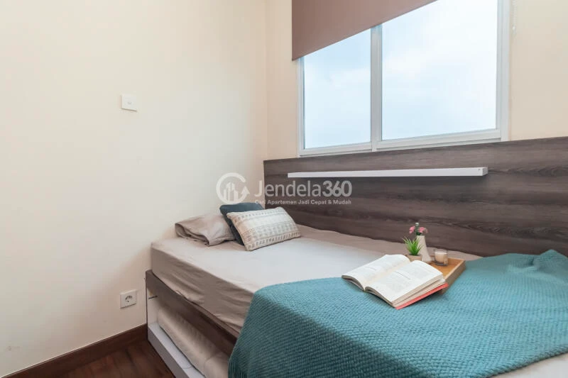 Bedroom 2 High Floor 2BR Apartment with City View at Puri Orchard Apartment