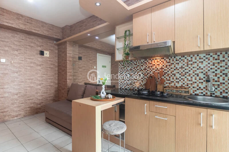 Kitchen Relaxed 2BR Apartment Low Floor with  View at Green Pramuka City Apartment