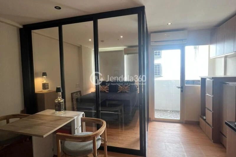 Living Room Homey Studio Apartment Middle Floor with City view View at Menteng Square Apartment