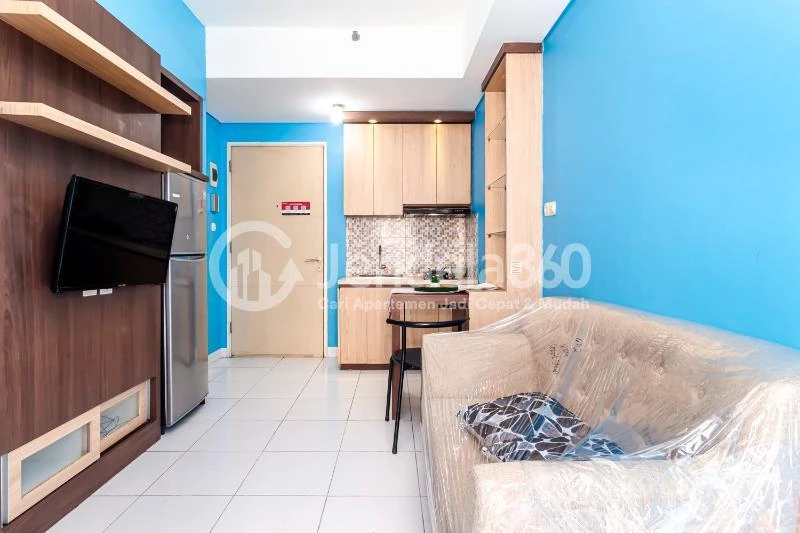 Living Room Cozy 2BR Apartment Middle Floor with City View at Kota Ayodhya Apartment