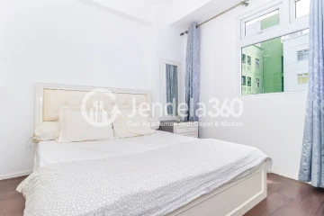 Bedroom 1 High Floor 2BR Apartment with  View at Green Pramuka City Apartment