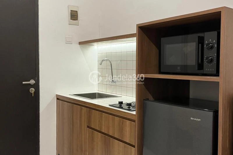 Kitchen Middle Floor 2BR Apartment with Hotel View at Grand Asia Afrika Residence