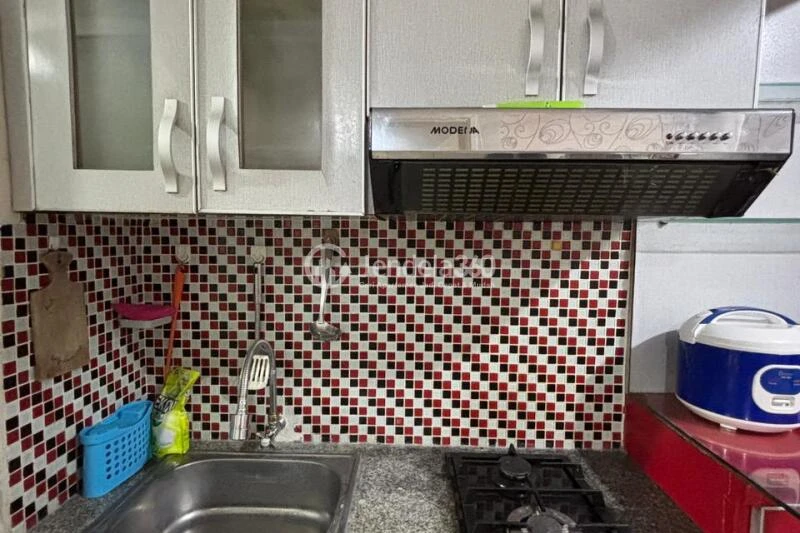 Kitchen Peaceful 2BR Apartment at Kalibata City Green Palace Low Floor
