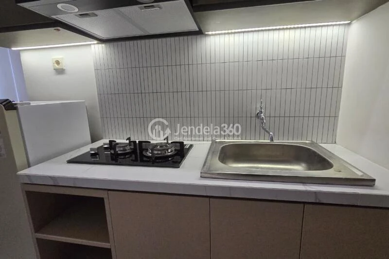 Kitchen Elegant Studio Apartment at Podomoro Golf View Apartment Middle Floor