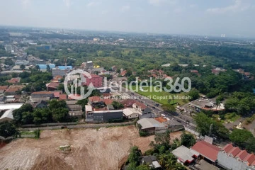 Balcony Spotless Studio Apartment High Floor with City View at Transpark Cibubur Apartment