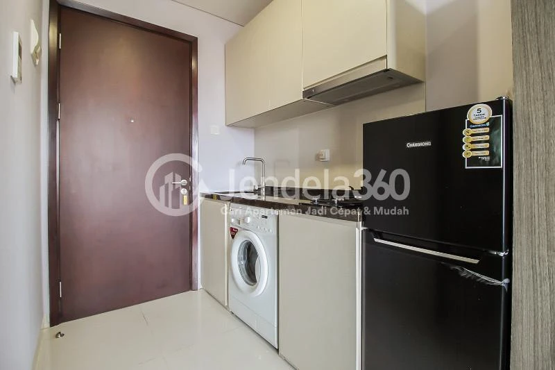 Kitchen A Riverside Studio Apartment with City View at Puri Mansion
