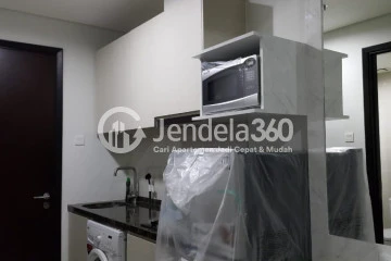 Kitchen Studio Apartment with Swimming Pool View at Puri Mansion