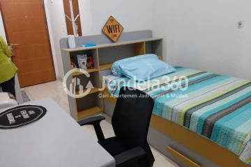 Bedroom Affordable Studio Apartment Middle Floor with City View at Dave Apartment