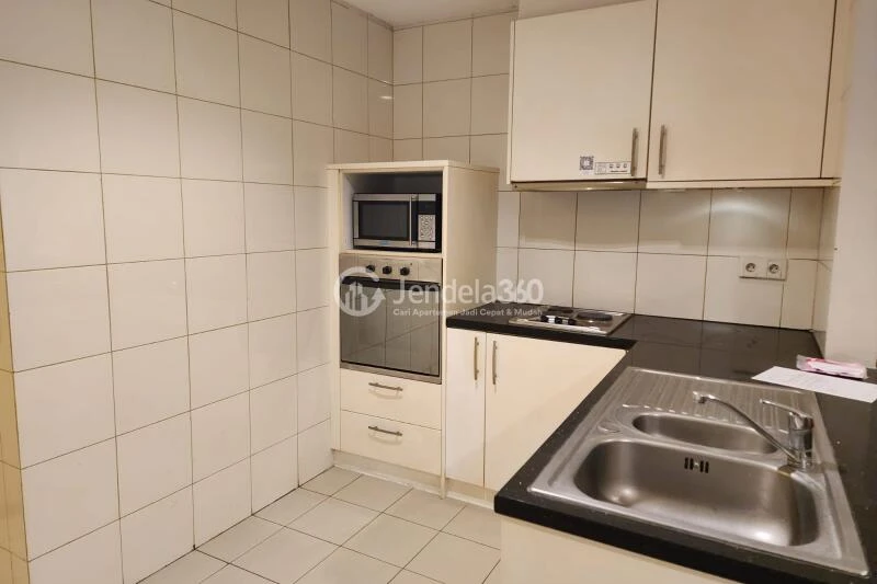 Kitchen 2BR Apartment with City View at Somerset Permata Berlian Residence