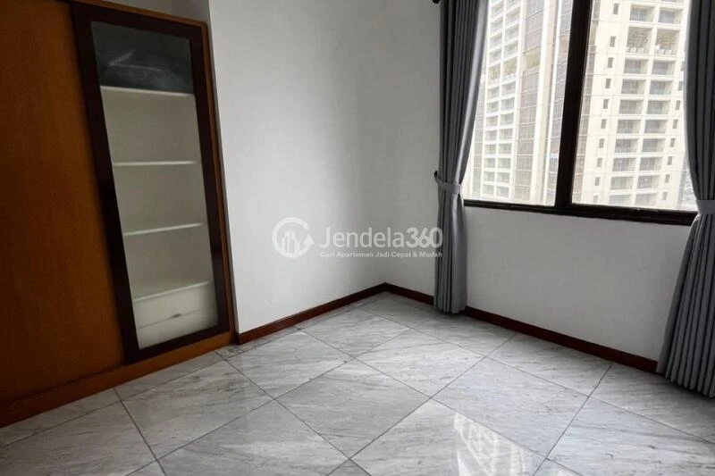 Bedroom 2 Flawless 3BR Apartment Middle Floor with City View at Simprug Indah Apartment