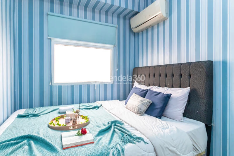 Bedroom 1 High Floor 2BR Apartment with City View at Green Pramuka City Apartment