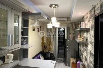 Living Room Homey 1BR Apartment at Paragon Village Apartment Tower B