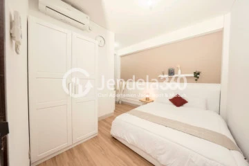 Bedroom 1 High Floor 2BR Apartment with City View at Transpark Cibubur Apartment