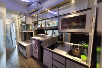 Kitchen Middle Floor 2BR Apartment with Jalan Asia Afrika View at Grand Asia Afrika Residence