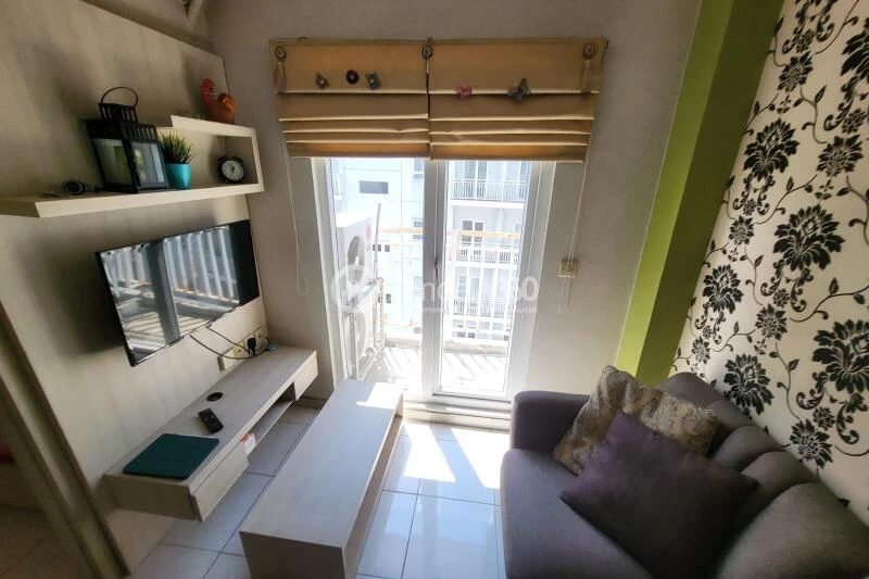 Living Room 2BR Apartment with Swimming Pool View at Grand Centerpoint Apartment