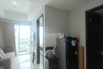 Living Room High Floor 1BR Apartment with City View at Puri Mansion