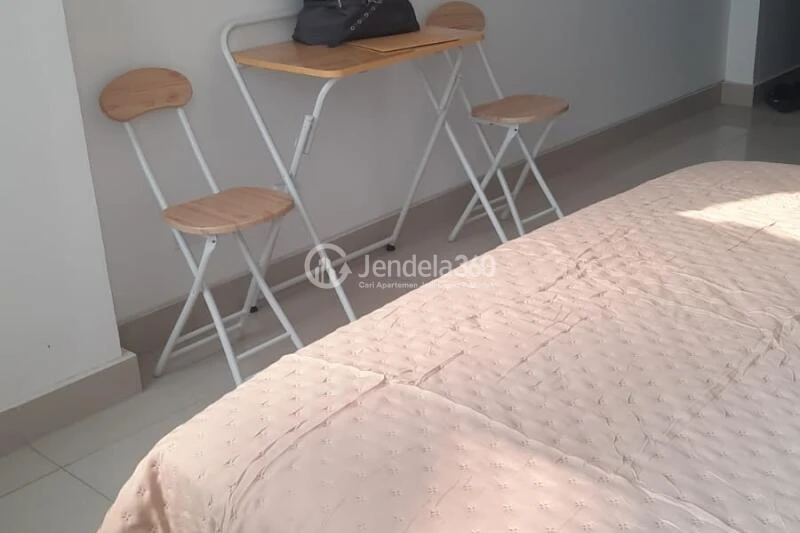 Bedroom Studio Pesona Depok Square Apartment at Middle Floor