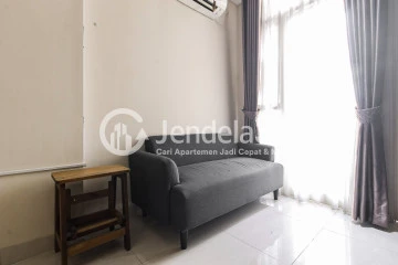 Living Room Homey 2BR Apartment with Stunning Scenery at Elpis Residence Apartment