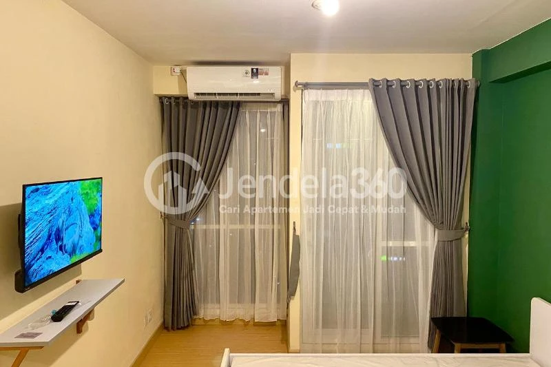 Bedroom Restful Studio Apartment Low Floor with  View at Tifolia Apartment