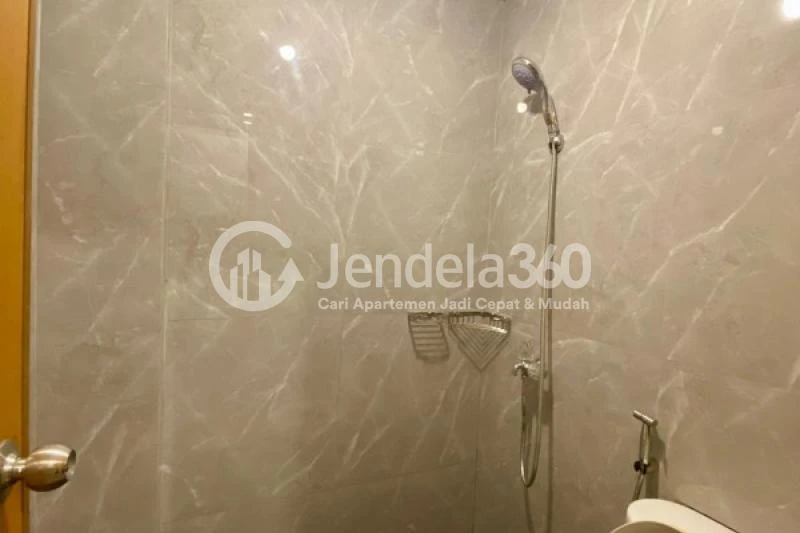 Bathroom Restful Studio Apartment Low Floor with  View at Tifolia Apartment
