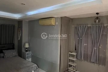 Bedroom Homey 1BR Apartment at Paragon Village Apartment Tower B