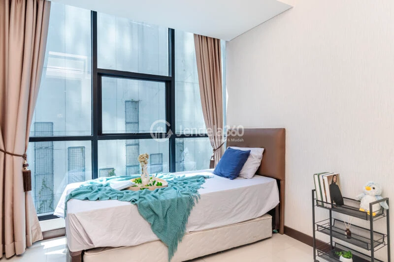 Bedroom 2 2BR Casa Grande Apartment at Low Floor Swimming Pool View