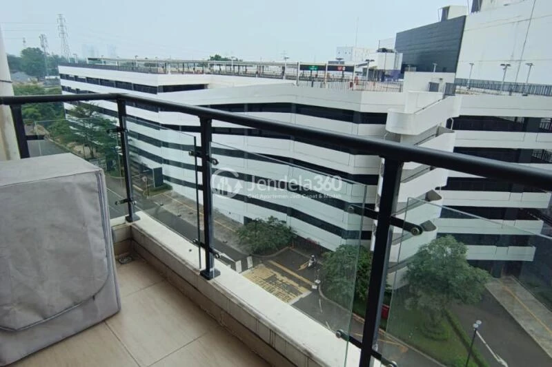 Balcony Lovely 3BR Apartment Low Floor with  View at Sky House BSD Apartment