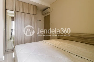 Bedroom 1 Homey 2BR Apartment with Stunning Scenery at Elpis Residence Apartment