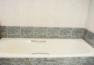 Bathroom Comfortable 2BR Apartment at Grand Tropic Suites Apartment Low Floor