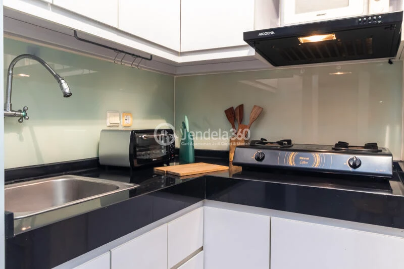Kitchen High Floor 2BR Apartment with City View at Sahid Sudirman Residence