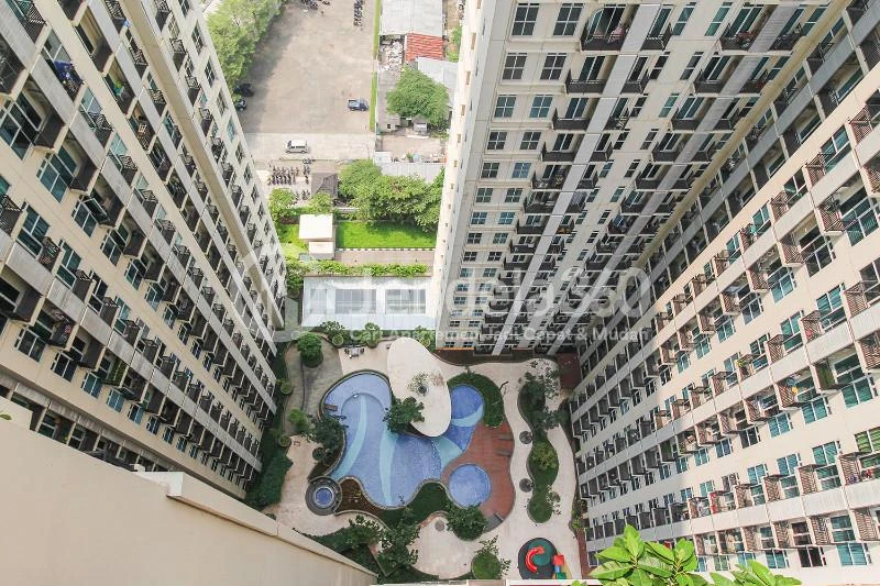 Balcony Modest Studio Apartment with City View from Heights at Puri Orchard Apartment