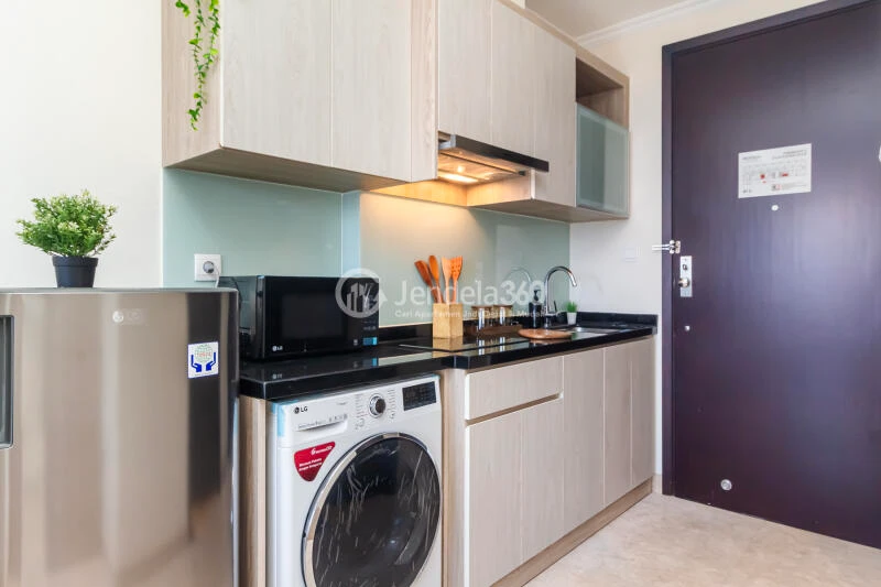 Kitchen Lovely Studio Apartment Low Floor with City View at Menteng Park