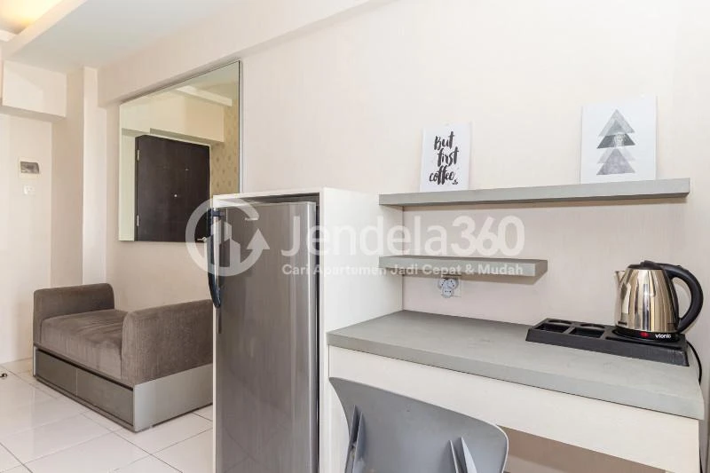 Living Room Restful 1BR Apartment at Kebagusan City Apartment Low Floor