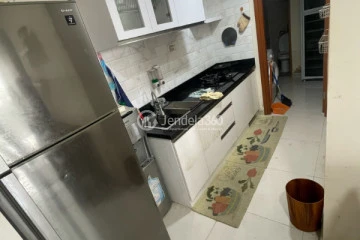 Kitchen Well Located 2BR Apartment Low Floor with  View at Grand Palace Kemayoran