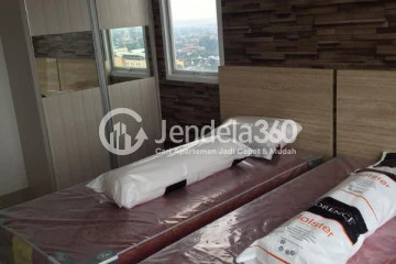 Bedroom Cozy 1BR Apartment High Floor with City View at Taman Melati Margonda Apartment